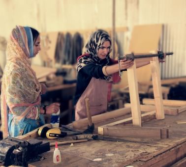Two ladies working at CIQAM  enterprise near Serena Altit Fort