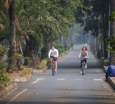 A Couple on a bike ride near Lake Kivu Serena Hotel