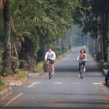 A Couple on a bike ride near Lake Kivu Serena Hotel