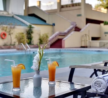 Orange juices served by the pool at Peshawar Serena Hotel