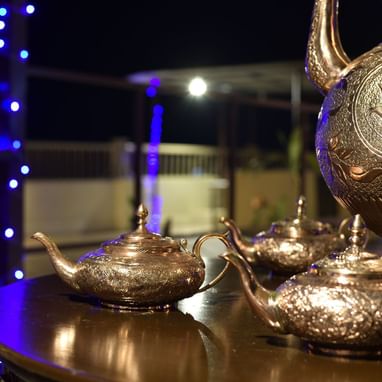 Brass teapots in Nazara Restaurant at Peshawar Serena Hotel