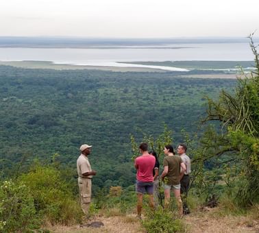 Group of people on a Nature walk near lake Manyara Serena Lodge