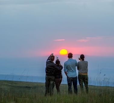 Tourists at Sundowners on The Crater Rim near Ngorongoro Serena